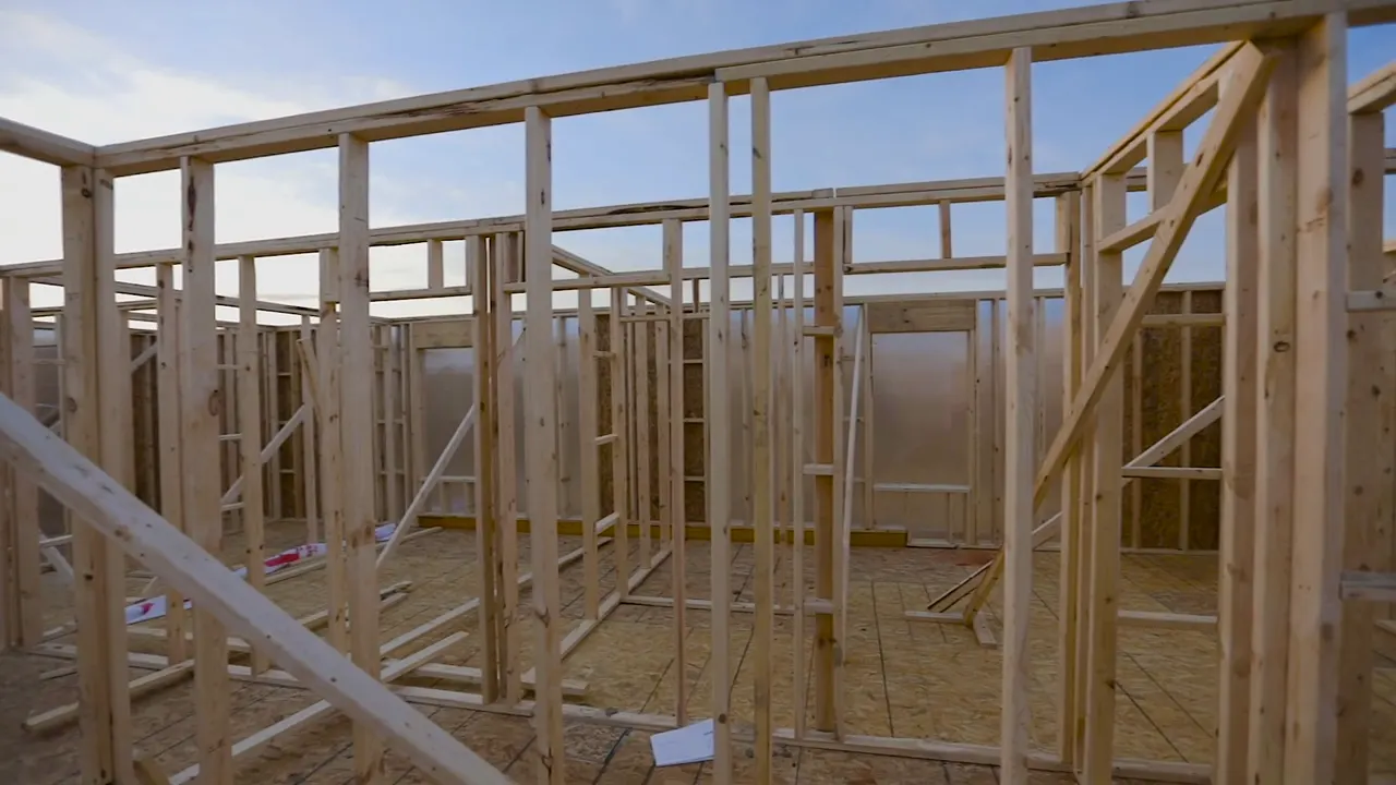 A whole storey framed in timber, open to the sky.